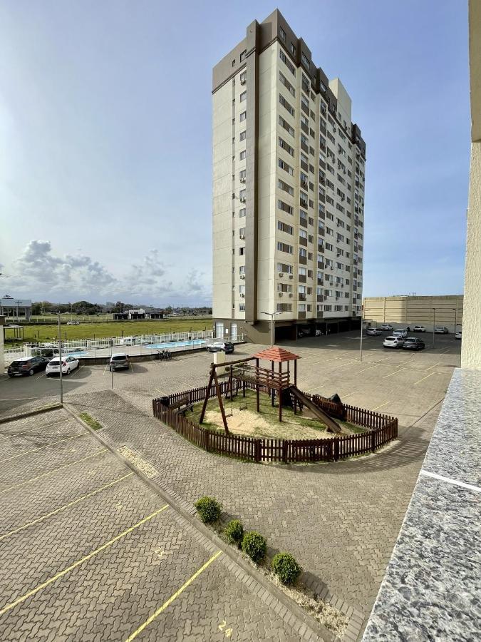 Apartamento completo para veraneio Torres Esterno foto